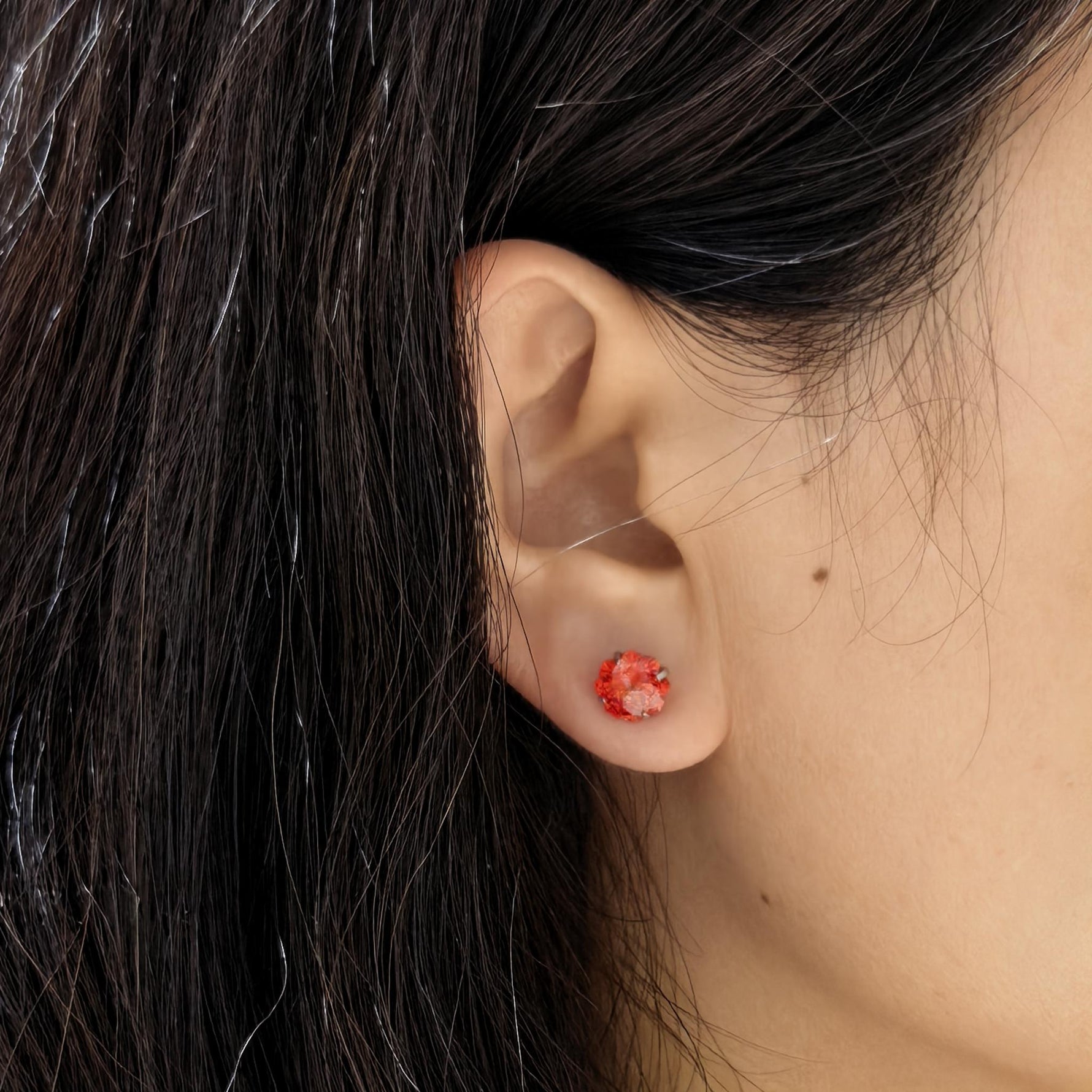 Ear wearing close‑up, big‑size 8mm four‑leaf‑clover cubic zirconia cartilage stud earring, easy‑open screw‑back backing