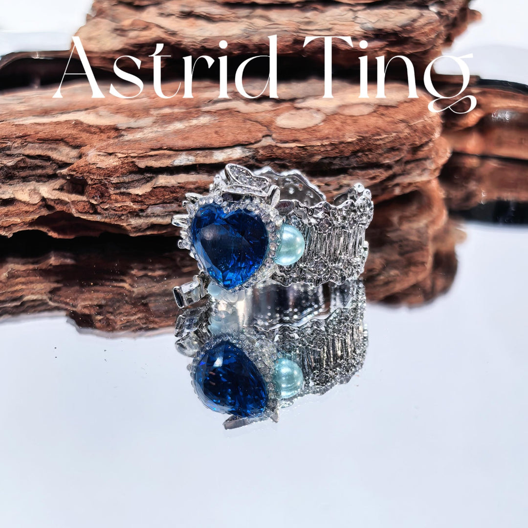 Handcrafted Heart Cut Blue Gemstone Statement Ring, 10mm Heart Brilliant Cut Aqua Blue Synthetic Gem with Cubic Zirconia Accents, Heavy Silver-plated Brass Adjustable Open Band Cocktail Ring