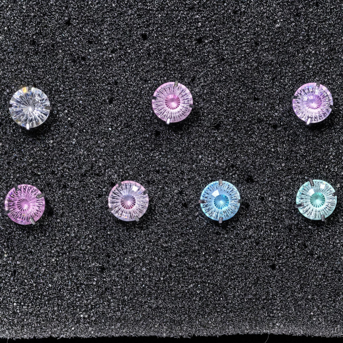 6mm conch‑cut iridescent multi‑color cz hypoallergenic titanium‑steel screw‑back studs flat‑lay